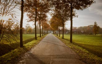 Photo of aerial view of the city of Bremerhaven with the harbor and traditional sailing-ships, Germany.