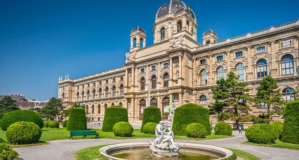 Photo of beautiful view of famous Naturhistorisches Museum (Natural History Museum) with park and sculpture in Vienna, Austria.