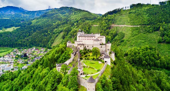 Hohenwerfen Castle or Festung Hohenwerfen aerial panoramic view. Hohenwerfen is a medieval rock castle overlooking the Austrian Werfen town in Salzach valley, Austria