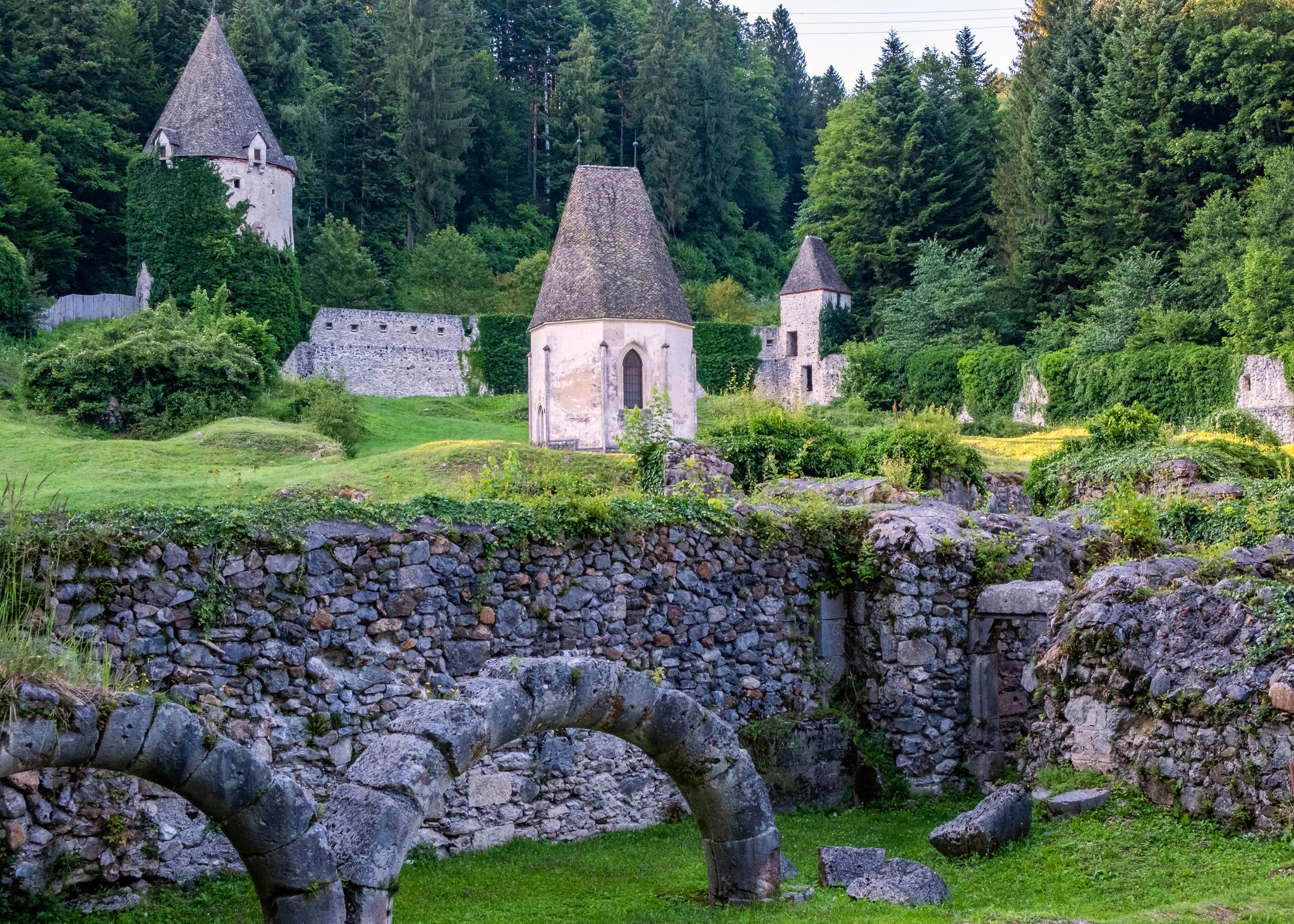 Photo of Žiče Charterhouse, arches in front,Stare Slemene,Slovenia.