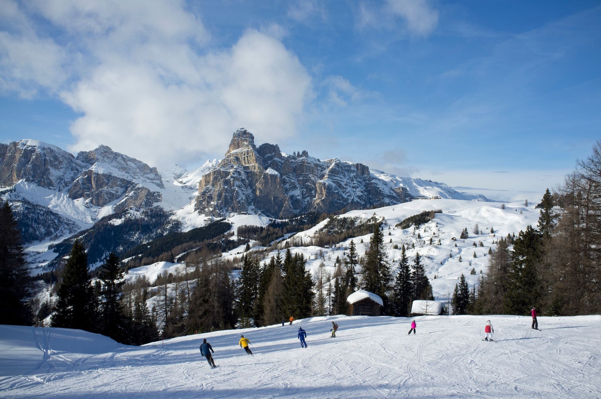 photo of Autumn morning panoramic shot on Stern-La Villa from San Cassiano, Piz la Ila, Gruppo Sella, Sassongher, Piza de Gherdenacia, Peitlerkofel in Italy.