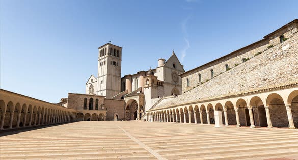 photo of view of Religious Architecture of The Basilica of Saint Francis of Assisi (Basilica di San Francesco d’Assisi) in Umbria, Perugia Province, Italy. (Part I).
