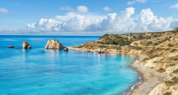 Photo of beautiful landscape with Petra tou Romiou ,Aphrodite's beach and rock in Pafos, Cyprus.