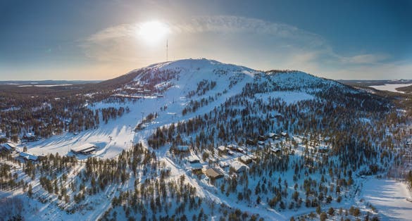 Photo of aerial beautiful view of Pyhätunturi fell in the sun in early spring, Finland.
