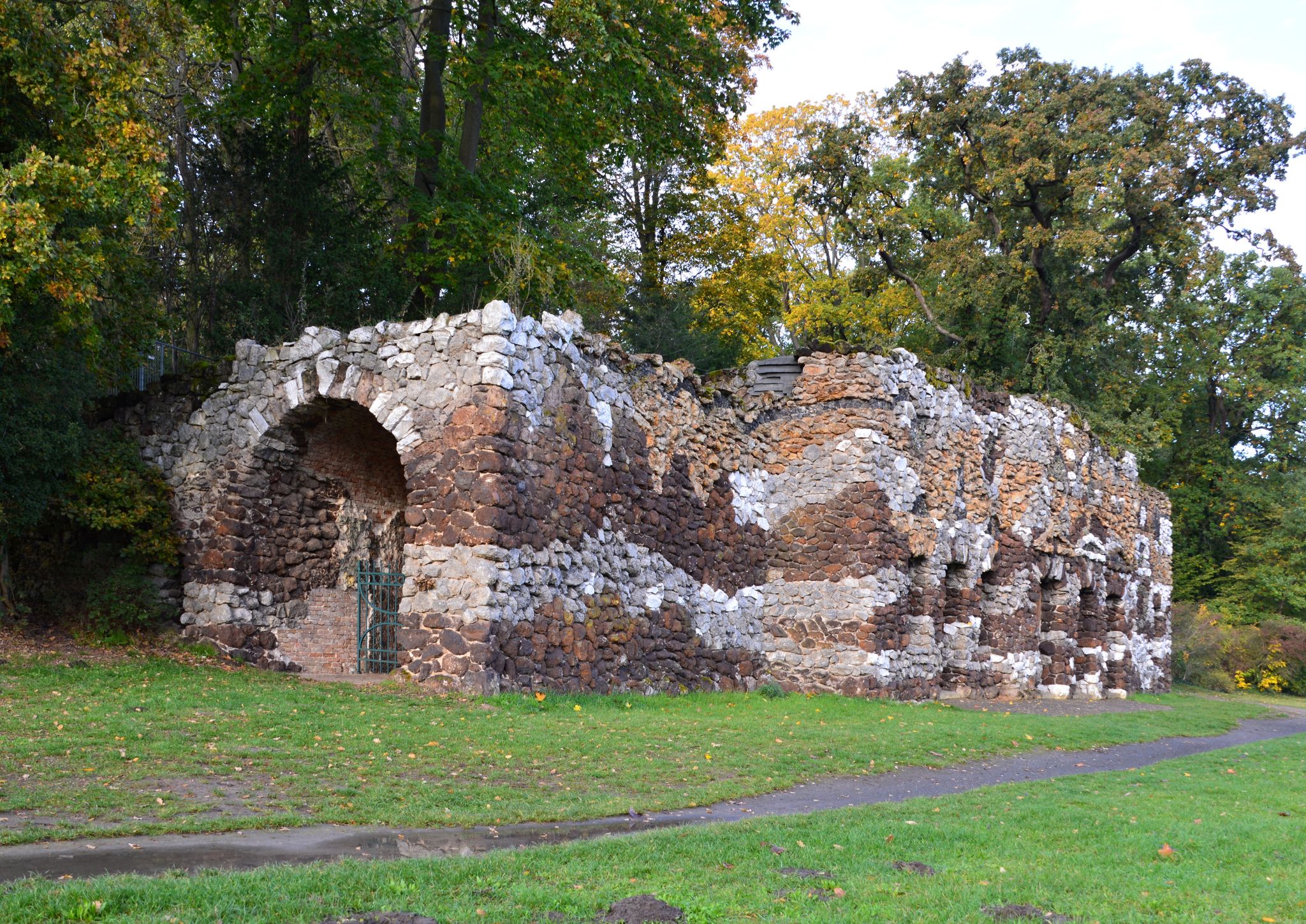 photo of view of Grotto in Autumn in the Park Neuer Garten, Potsdam, the Capital City of Brandenburg, Potsdam, Germany.