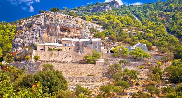 Photo of Pustinja Blaca hermitage on the rock, island of Brac, Dalmatia, Croatia.