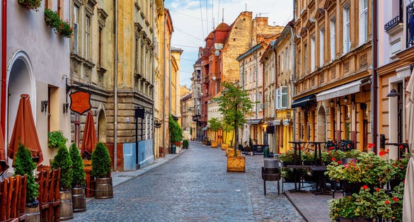 Photo of traditional houses in a pedestrian street in historical old town of Lviv, Ukraine.