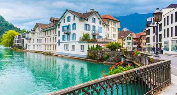 Photo of Interlaken town with Thunersee river, Switzerland .
