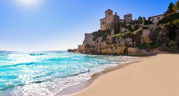 Platja de Tamarit in Altafulla of Tarragona at Catalonia and Castle.