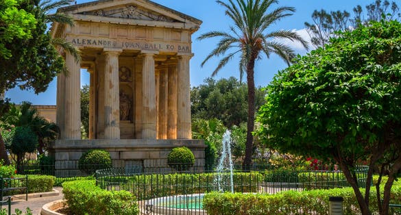 Photo of Lower Barrakka gardens and the monument to Alexander Ball in Valletta, Malta.