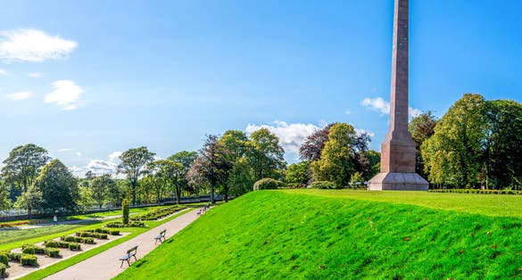 Photo of Panoramic view of Duthie park alley with river Dee and McGrigor obelisk, Aberdeen, Scotland .