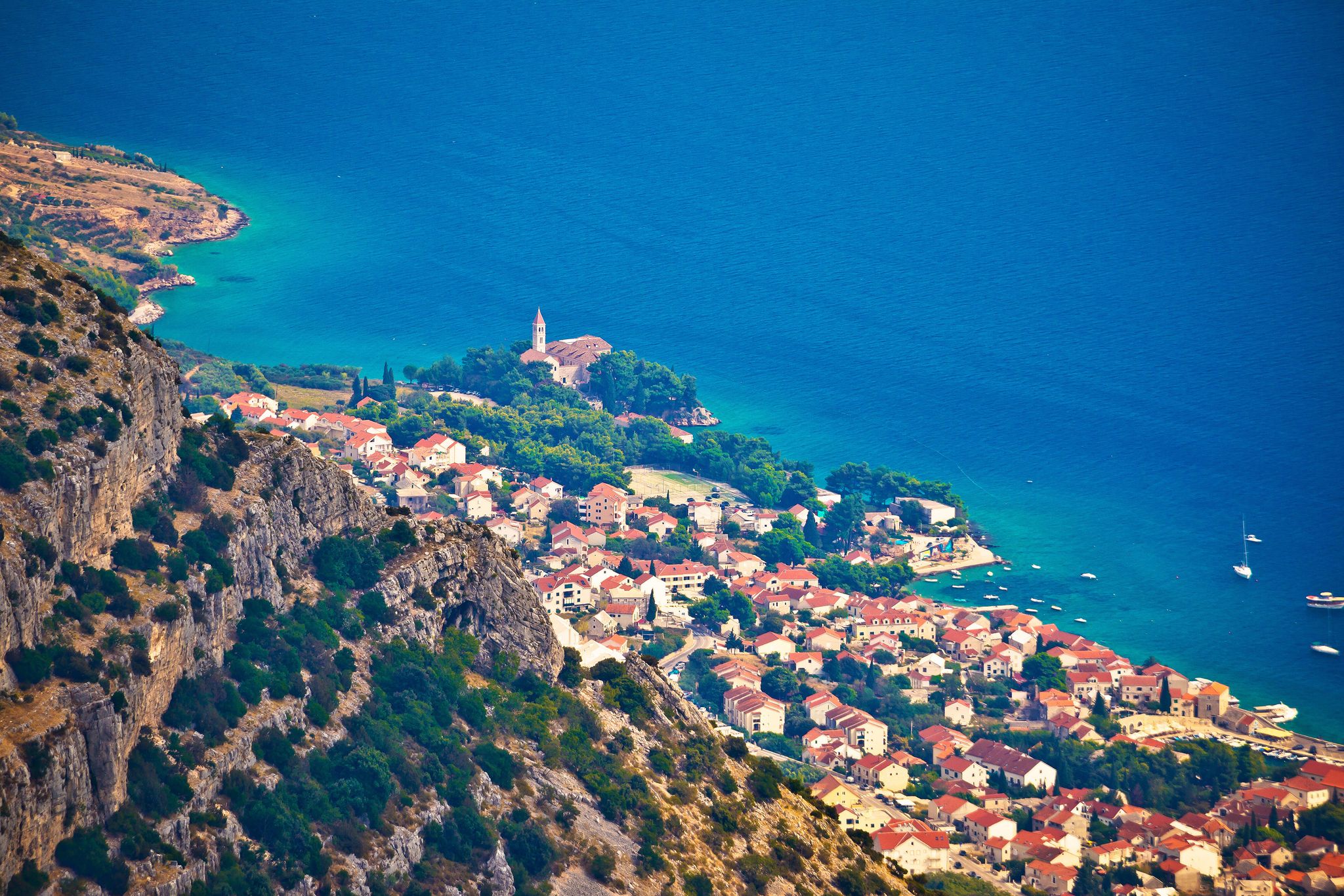 Photo of town of Bol from Vidova Gora aerial view, Island of Brac, Dalmatia, Croatia.