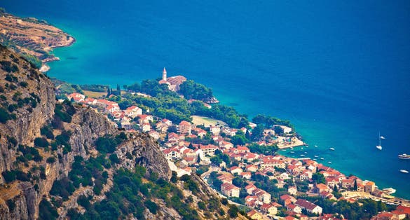 Photo of town of Bol from Vidova Gora aerial view, Island of Brac, Dalmatia, Croatia.