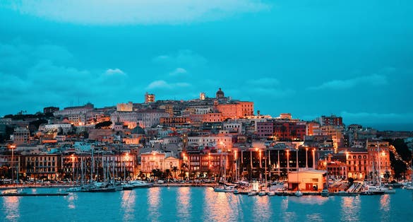 Cagliari cityscape and architecture with Mediterranean Sea on Sardinia island, Summer Italy.