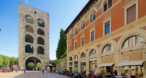 Como city, historic center, lake Como, northern Italy. Medieval tower (12th century), called Porta Torre and via Cantù