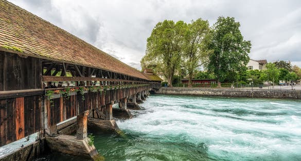 Photo of Gottibachsteg pedestrian bridge view over the Aare River in Thun, Switzerland.