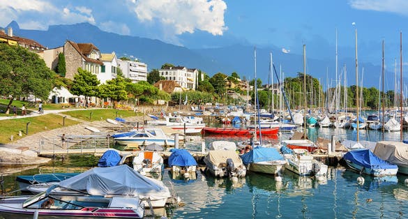 Photo of sail boats at marina on Geneva Lake Riviera in Vevey, Vaud canton, Switzerland.