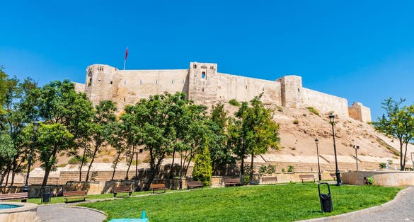 Photo of Gaziantep Kalesi Castle Breathtaking Picturesque Frontal View on a Blue Sky Day in Summer, Turkey.