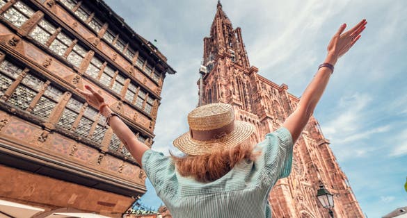 Photo of view to the famous Notre Dame Cathedral, tourist in Strasbourg, France.