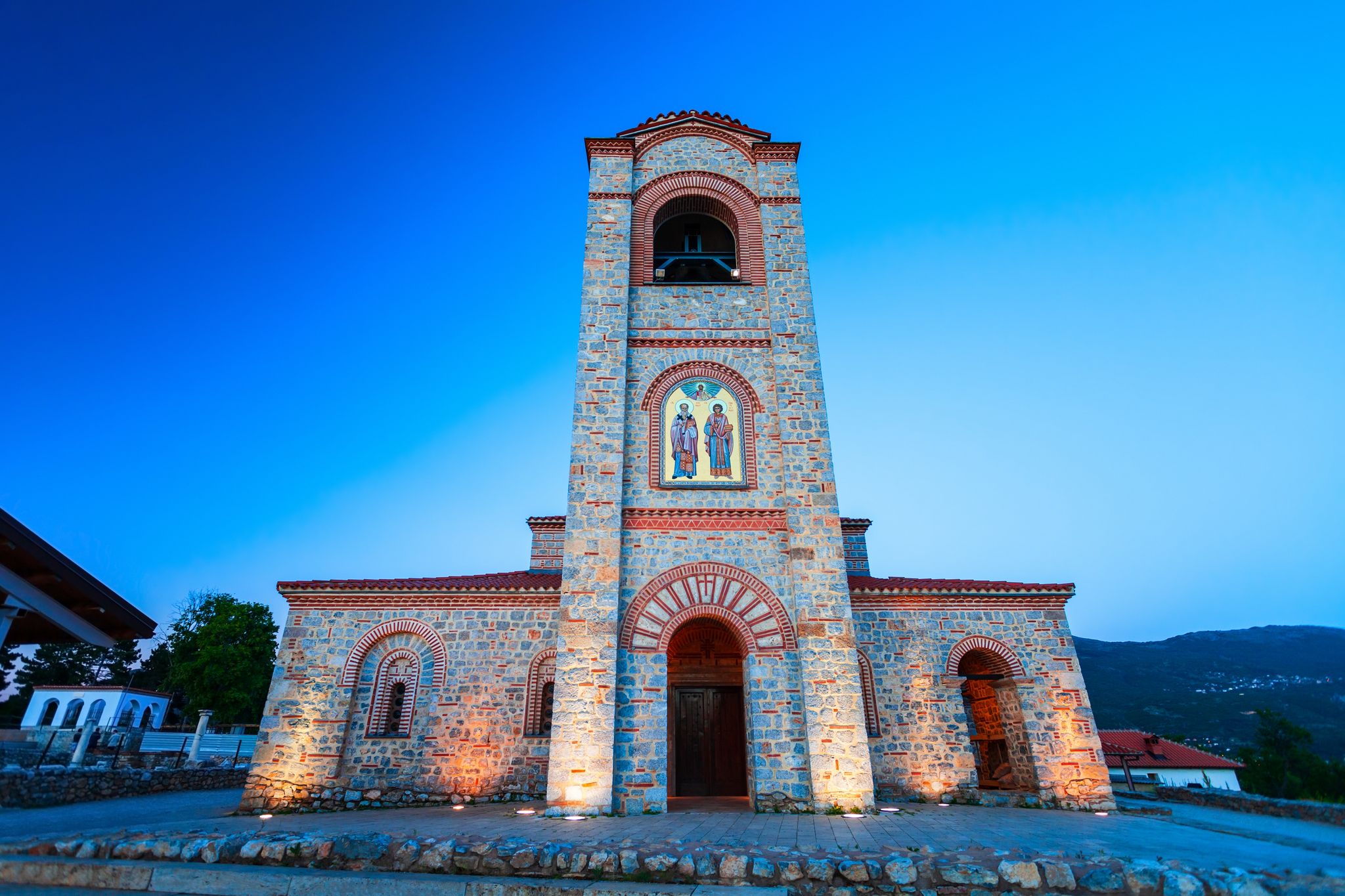 Photo of the bell tower of St. Clement’s Church in Ohrid at sunset, North Macedonia.