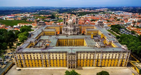 Portugal: aerial top view of the Royal Convent and Palace of Mafra, baroque and neoclassical palace – monastery next to Lisbon