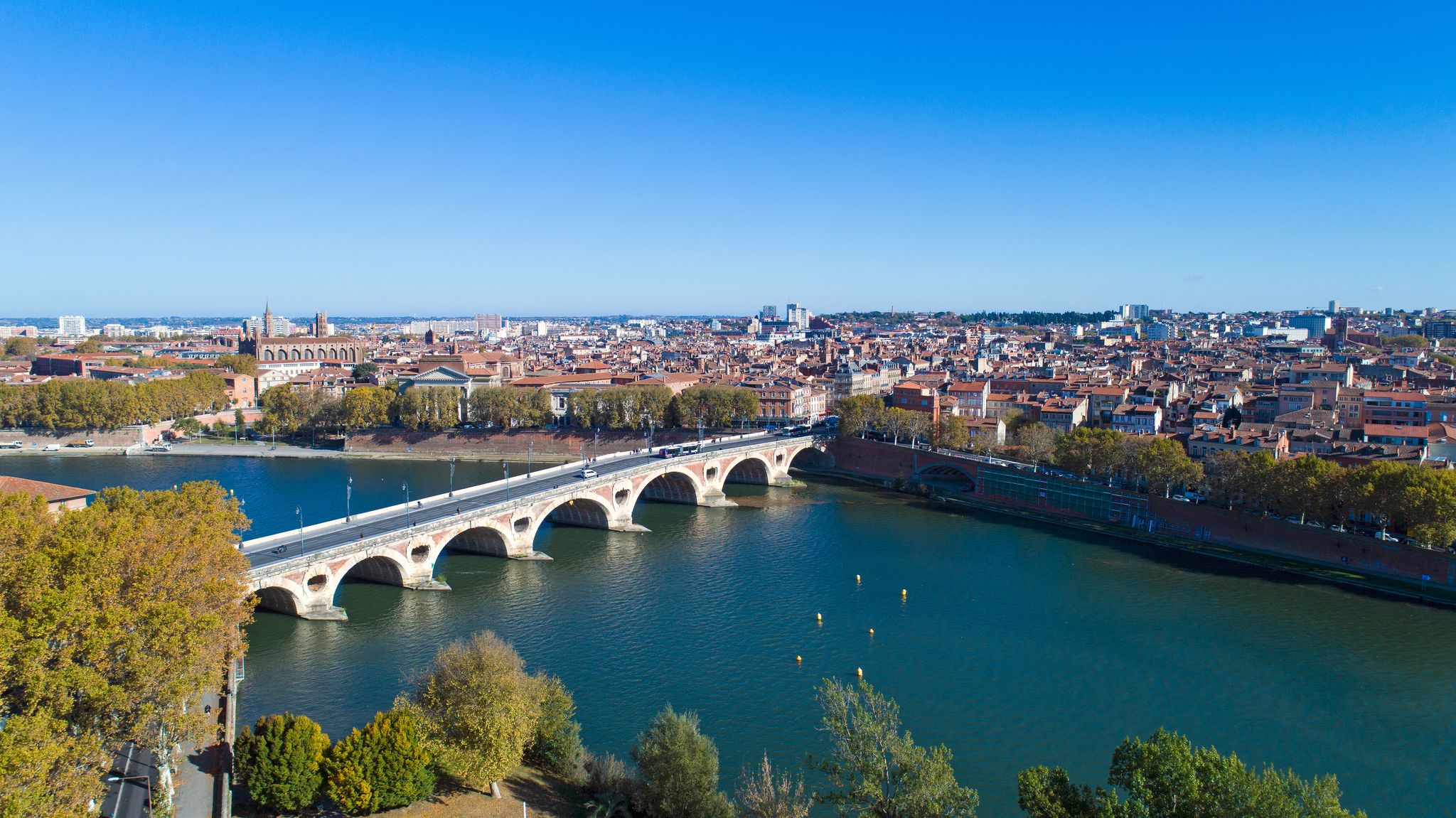 photo of aerial view over Toulouse city center with the Pont Saint-Pierre in Haute Garonne, France.