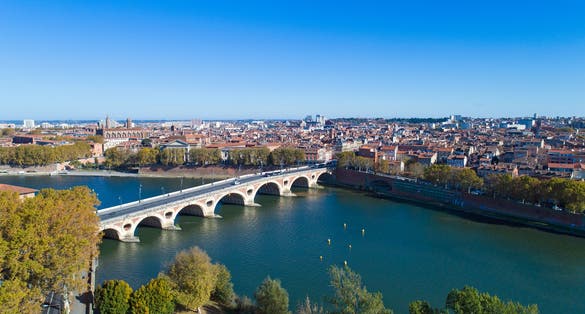photo of aerial view over Toulouse city center with the Pont Saint-Pierre in Haute Garonne, France.