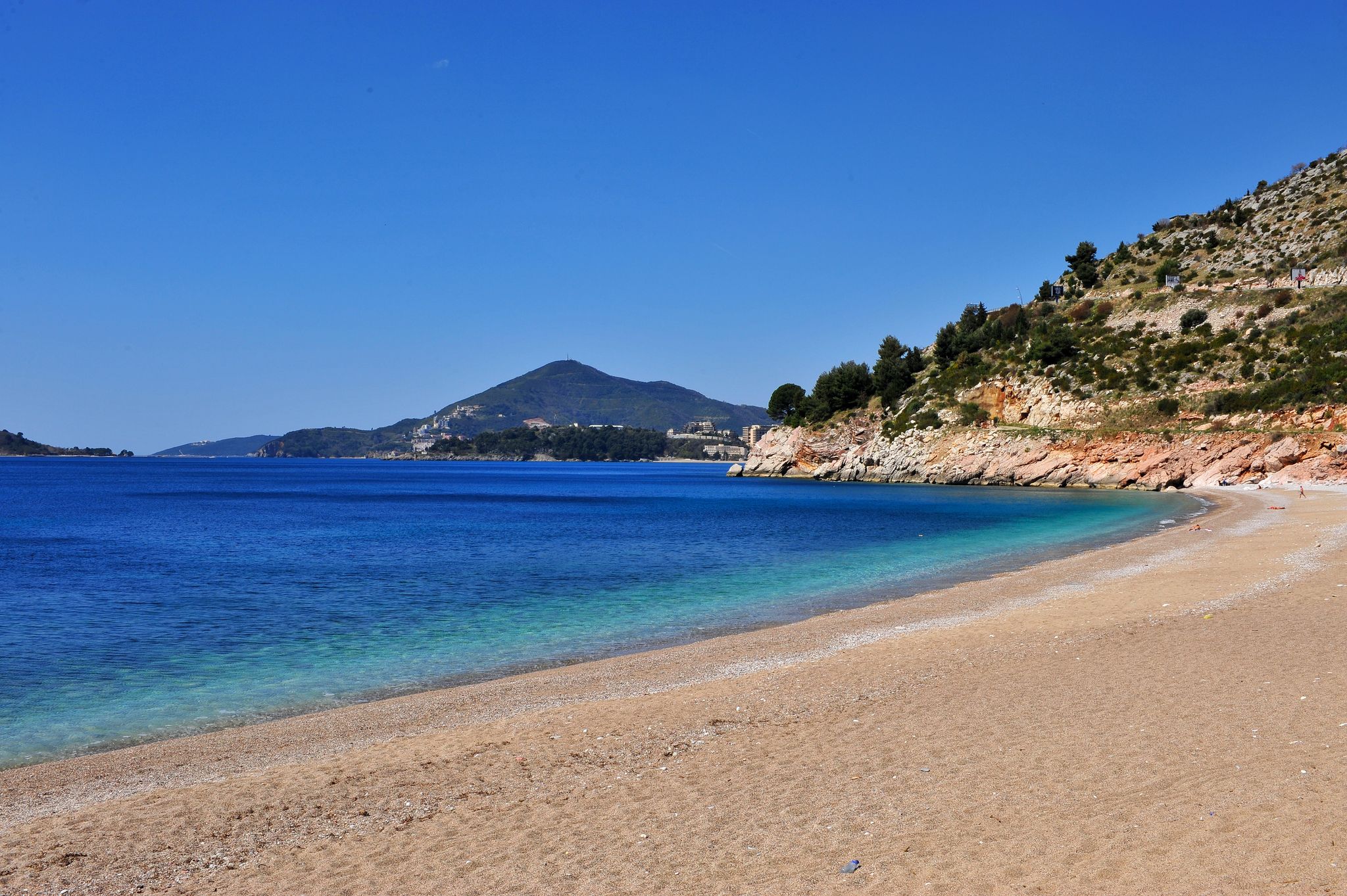 Photo of beautiful sand beach in Becici resort, Montenegro.