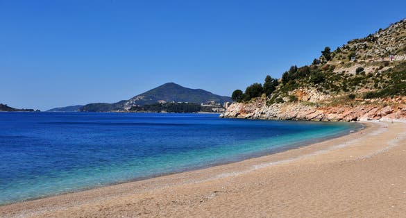 Photo of beautiful sand beach in Becici resort, Montenegro.