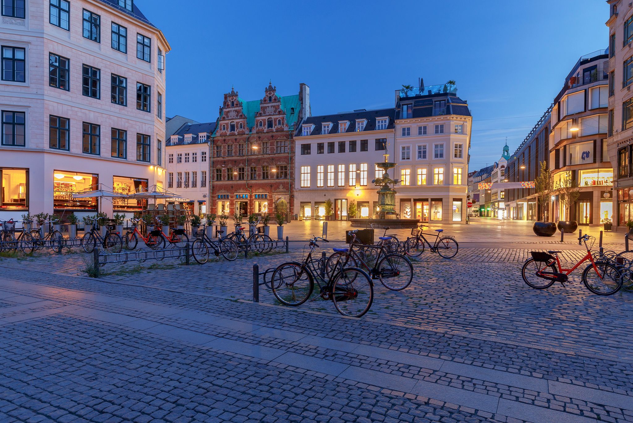 Photo of Stork Fountain on the Amagertorv (Amager Square) and the longest pedestrian street in the world Stroget in Copenhagen, Denmark.