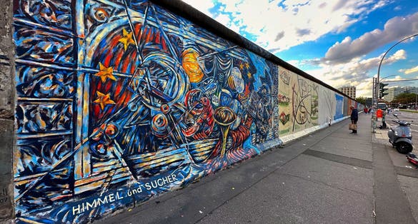 Photo of Graffiti at the East Side Gallery in Berlin, Germany, the East Side Gallery is the longest preserved stretch of the Berlin wall.