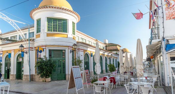 Photo of the main street with unique building in Vila Real de Santo Antonio, Algarve, Portugal.