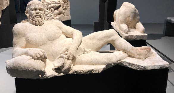 Reclining portrait of Silenus. limestone - 2nd century.
