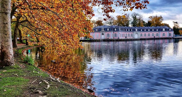 photo of view of  A picture of Benrath Castle in Autumn with Lakeview in Düsseldorf Germany