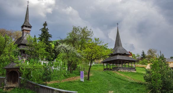 Photo of The traditional wooden Poienile Izei Hill Church. Maramures, Romania.