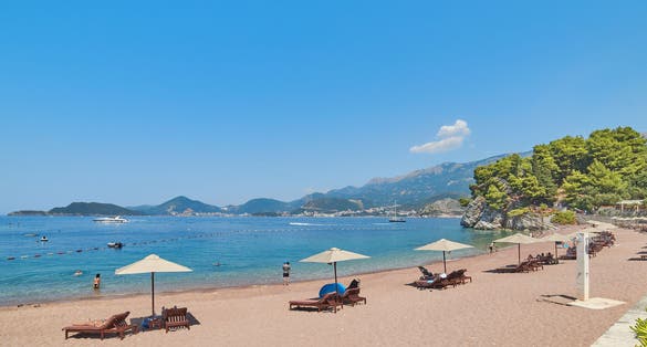 Photo of beautiful Sveti Stefan beach, Budva, Montenegro.