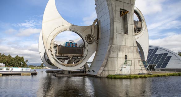 The Falkirk Wheel is a rotating boat lift in Falkirk, Scotland, connecting the Forth and Clyde Canal with the Union Canal.