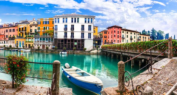 Photo of Peschiera del Garda - charming village with colorful houses in beautiful lake Lago di Garda. Verona province, Italy.