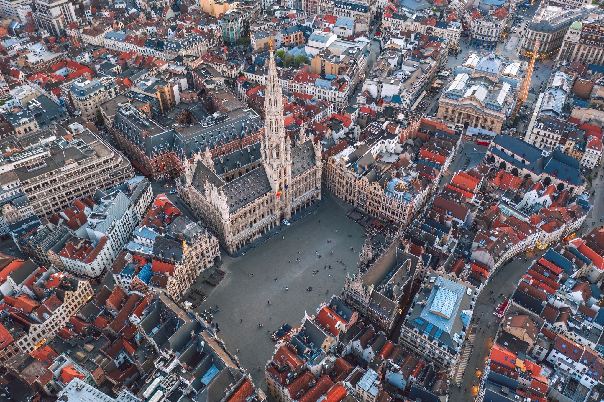 Photo of aerial view of Grand Place square and Town Hall (Hôtel de Ville de Bruxelles). Sunset cityscape of the City of Brussels, Belgium.