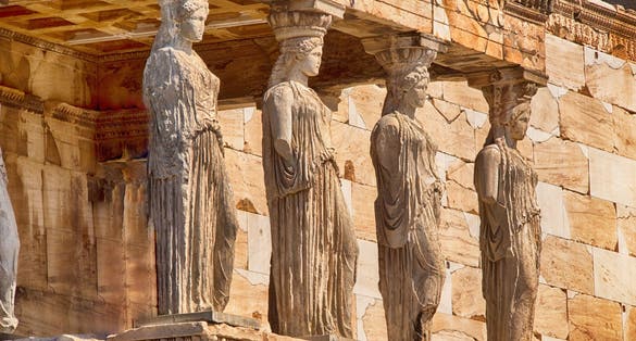 Photo of detail of caryatids statues on the Parthenon on Acropolis Hill, Athens, Greece.