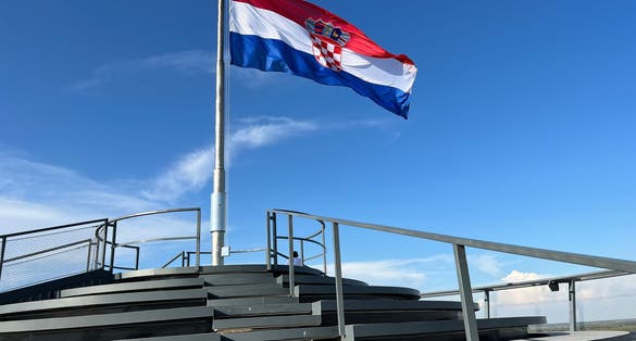 Photo of the roof structure of the Vukovar water tower with a panoramic view of Vukovar and Danube.