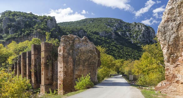 Photo of Roman aqueduct of ancient Nikopolis starts from the northern end of the valley of the Louros, Preveza, Greece.