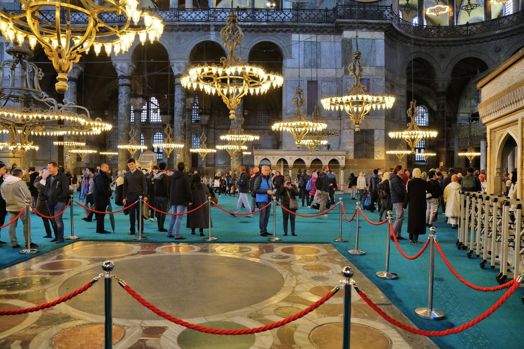 : People visit Hagia Sophia Grand Mosque in Istanbul, Turkey. UNESCO World Heritage Site in Fatih district of Istanbul.