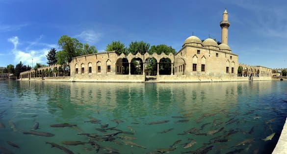photo of view of Stitched Panorama of Balikligol (Pool of Abraham) in Sanlıurfa Turkey. A sacred lake with thousands of sacred carp and a biblical history, Şanlıurfa, Turkey.