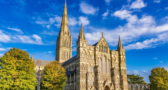 Photo of Salisbury Cathedral, formally known as the Cathedral Church of the Blessed Virgin Mary, an Anglican cathedral in Salisbury, England.