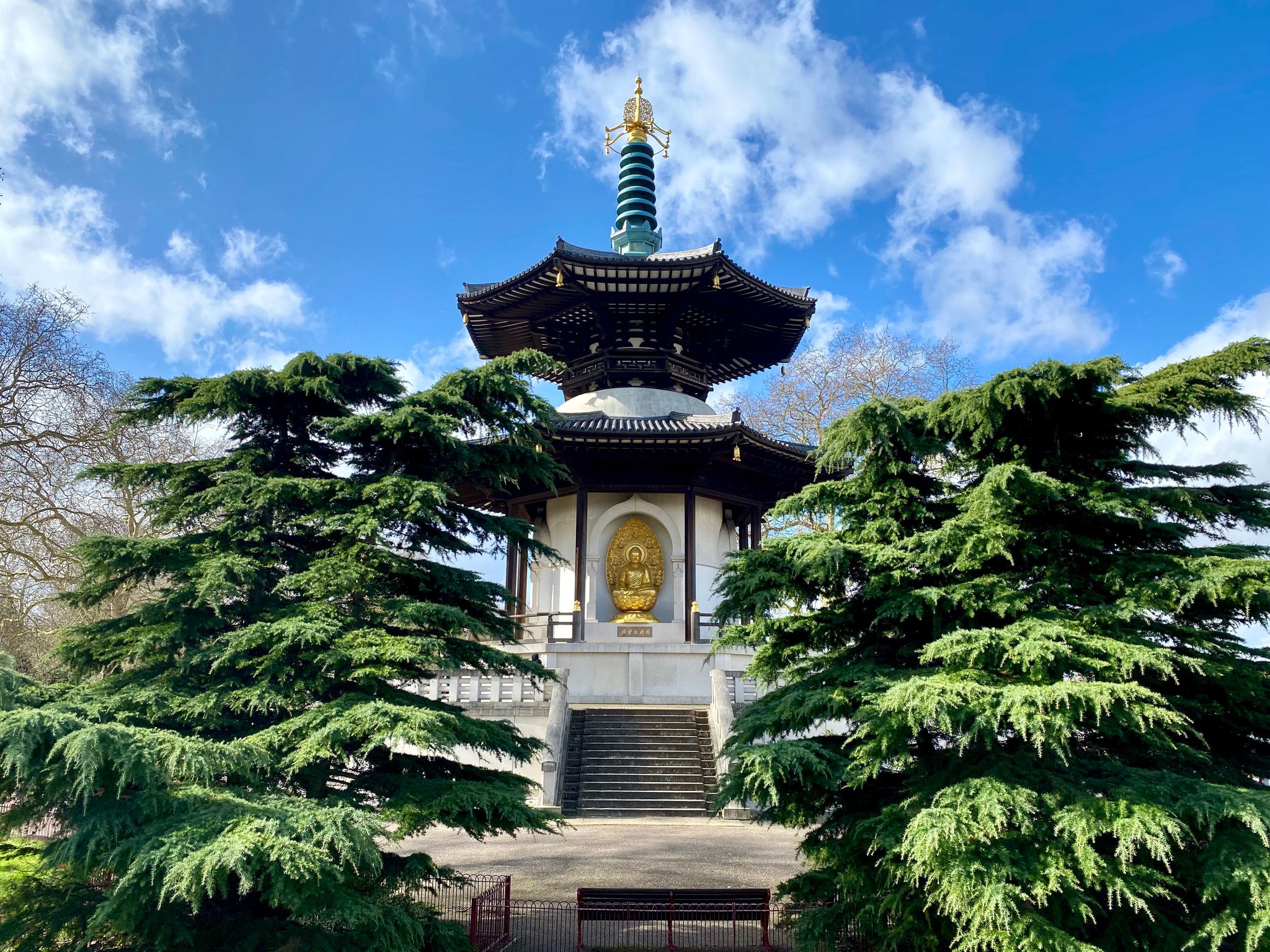 Photo of 'Will Make Tranquil This Realm of Mine'  on the East niche of the beautiful Peace Pagoda in Battersea Park, London, UK.