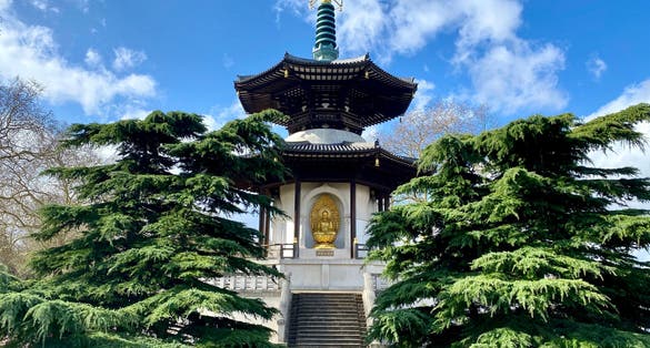 Photo of 'Will Make Tranquil This Realm of Mine'  on the East niche of the beautiful Peace Pagoda in Battersea Park, London, UK.