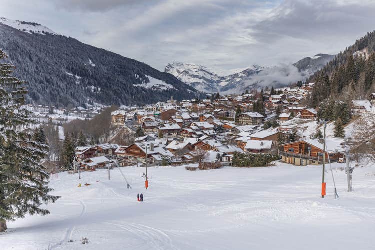 The first snow of  winter falls on the pretty French Alpine Village of Les Contamines-Montjoie