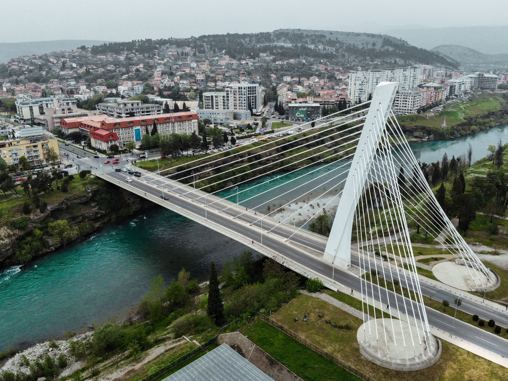 Photo of aerial view of Millennium bridge over Moraca river in Podgorica, Montenegro.