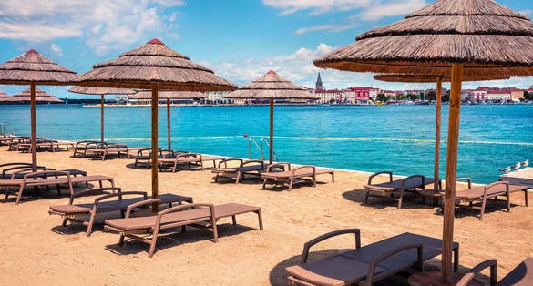 Splendid spring view of popular summer resort Porec. Colorful spring seascape of Adriatic Sea. Great morning scene of Istrian Peninsula in western Croatia, Europe. Vacation concept background.